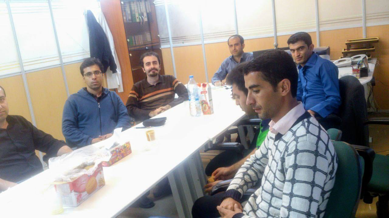 Participants seated around a long table during an early KurdSoftware session.